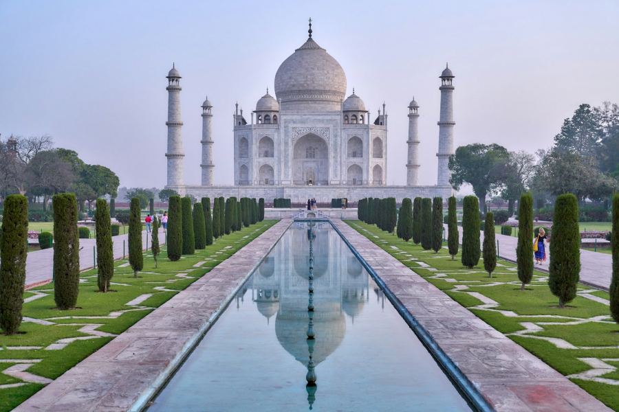 Invisalign cost comparison — Taj Mahal at sunrise